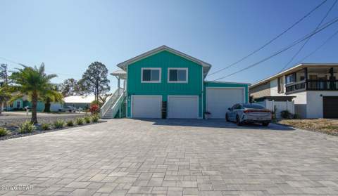 7013 S Lagoon Drive, Panama City Beach FL - photo 7 of 57