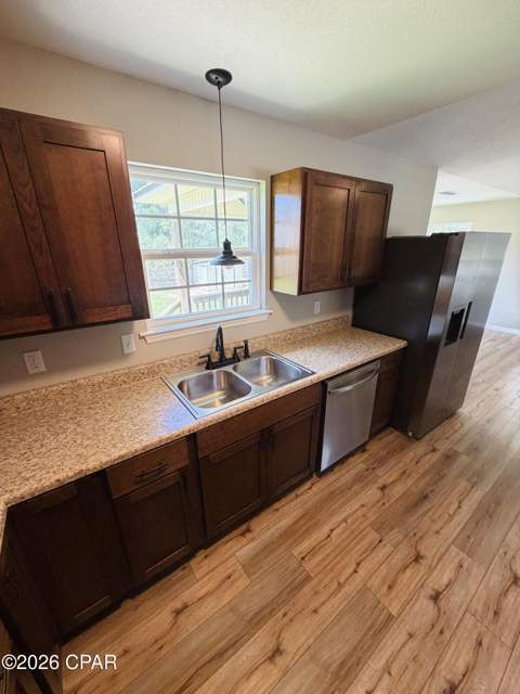 6601 Grande Oak Loop, Grand Ridge FL - photo 6 of 24
