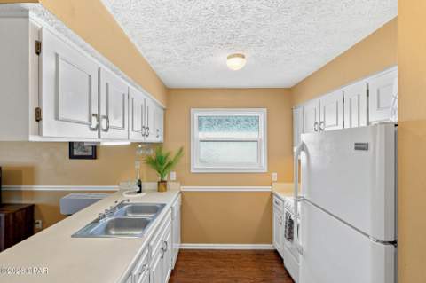 7813 N Lagoon Drive 4E, Panama City FL - photo 9 of 49