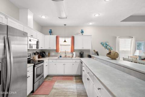 7018 S Lagoon Drive, Panama City Beach FL - photo 15 of 74