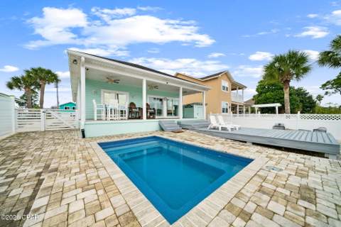 7018 S Lagoon Drive, Panama City Beach FL - photo 7 of 74