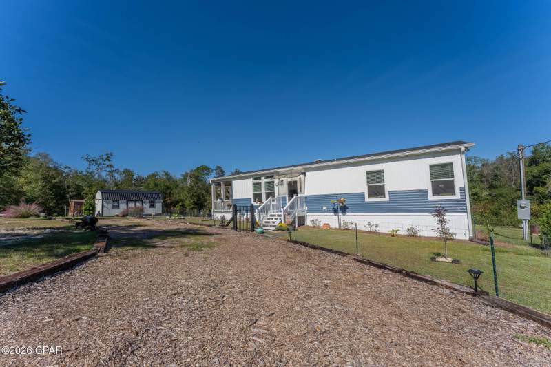 3 bedroom ManufacturedHome at 1305 Sandusky Circle, Compass Lake Hills Unit 6, Alford — photo 2