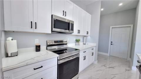 2911 22nd St SW, Lehigh Acres FL - photo 10 of 38
