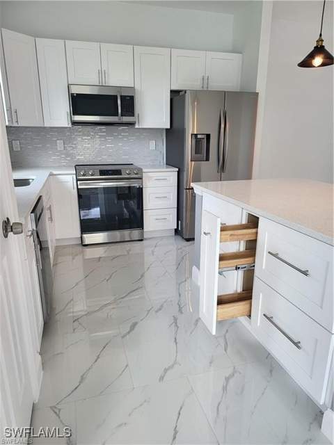 2815 Van Buren Pkwy, Cape Coral FL - photo 9 of 28