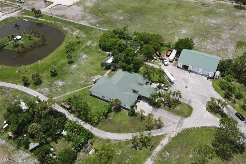 4 bedroom SingleFamilyResidence at 2400 Oil Well Rd, Golden Gate Estates, Naples — photo 2