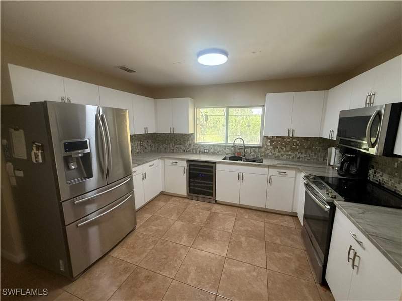 5 bedroom SingleFamilyResidence at 4335 18th Ave SE, Golden Gate Estates, Naples — photo 5