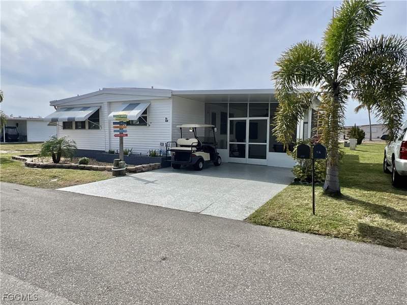 2 bedroom ManufacturedHome at 290 Valencia Dr, Orange Harbor Mobile Home Park, Fort Myers — photo 3