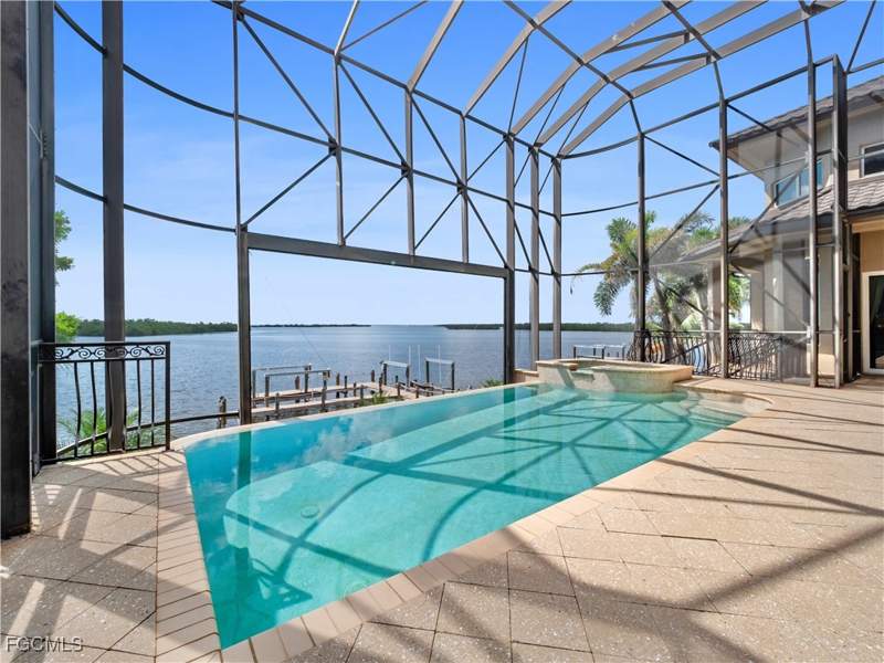 4 bedroom SingleFamilyResidence at 14761 Jonathan Harbour Dr, Jonathan Harbour, Fort Myers — photo 3