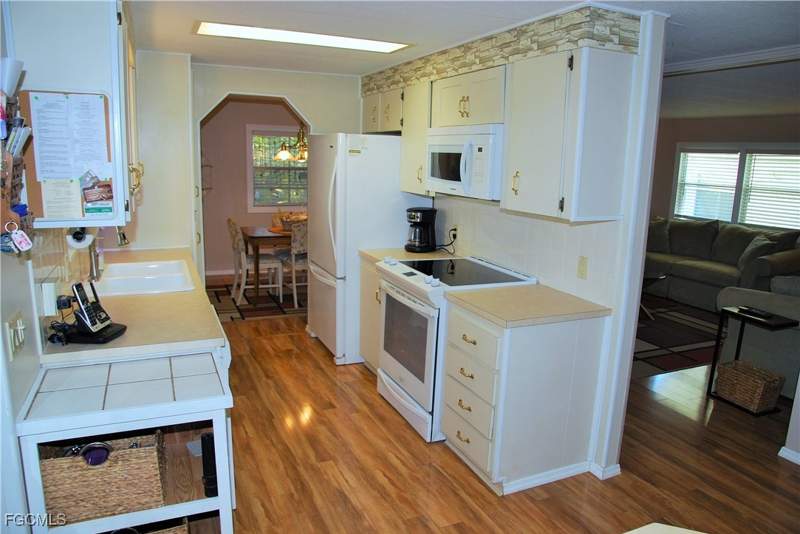 2 bedroom ManufacturedHome at 395 Snead Dr, Six Lakes Country Club, North Fort Myers — photo 4
