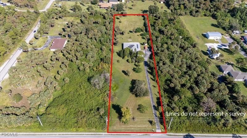 4 bedroom SingleFamilyResidence at 2831 White Blvd, Golden Gate Estates, Naples — photo 2