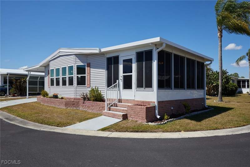 2 bedroom ManufacturedHome at 15 Ilex St, Oak Park Village Co-Op Inc, Alva — photo 2