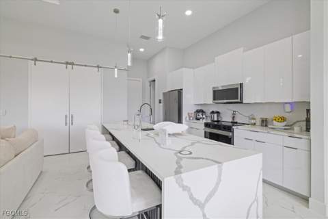 1310 NW 10th Ter, Cape Coral FL - photo 7 of 36