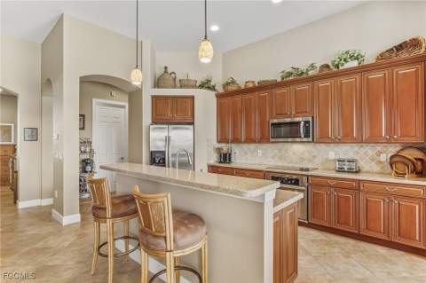 5675 Whispering Willow Way, Fort Myers FL - photo 7 of 39