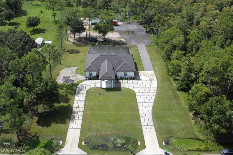 4 bedroom SingleFamilyResidence at 62 35th Ave NE, Golden Gate Estates, Naples — photo 2