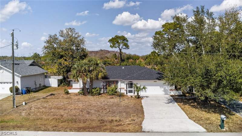 4 bedroom SingleFamilyResidence at 11225 Rabun Gap Dr NW, Timberbend Subd, North Fort Myers — photo 2