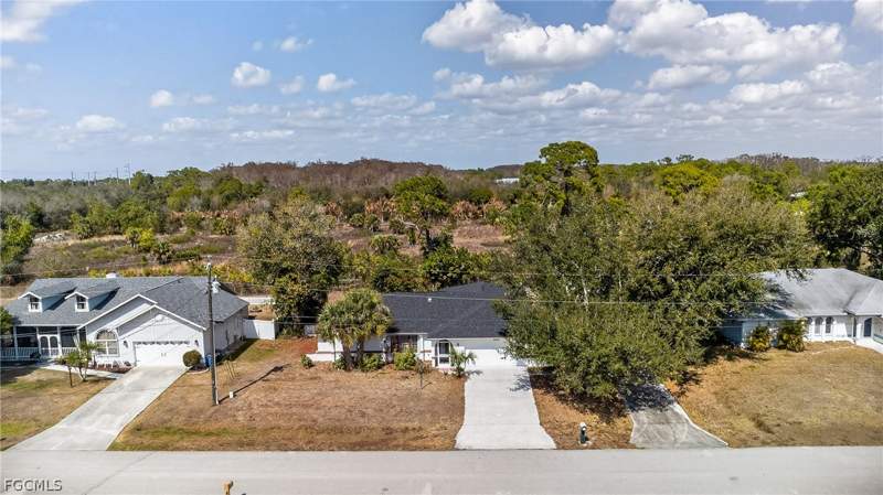 4 bedroom SingleFamilyResidence at 11225 Rabun Gap Dr NW, Timberbend Subd, North Fort Myers — photo 3