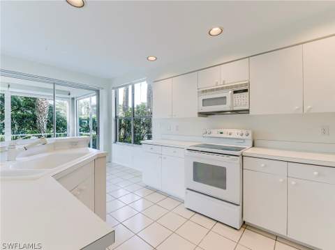 25203 Pelican Creek Cir 102, Bonita Springs FL - photo 6 of 38