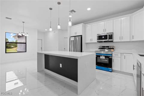 845 Milano Ave S, Lehigh Acres FL - photo 12 of 34