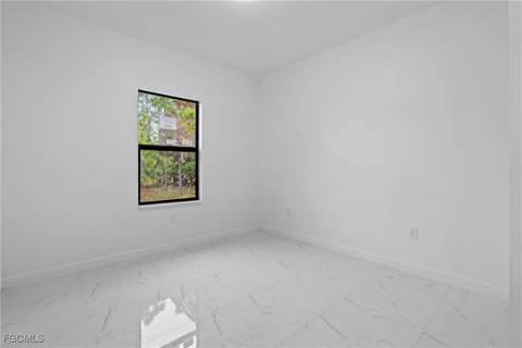 845 Milano Ave S, Lehigh Acres FL - photo 13 of 34