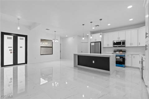 845 Milano Ave S, Lehigh Acres FL - photo 8 of 34