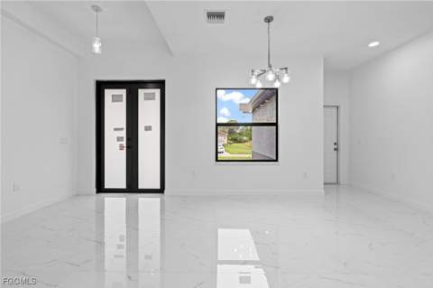 845 Milano Ave S, Lehigh Acres FL - photo 9 of 34