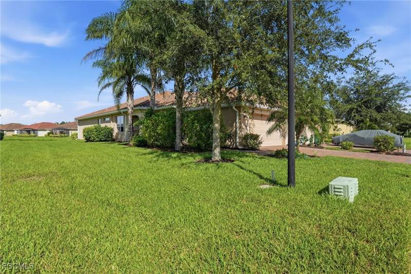 2 bedroom Attached at 2009 Tamarron Ln, Orange Blossom Ranch, Naples — photo 2