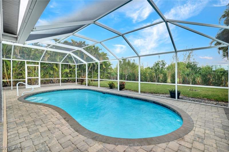 4 bedroom SingleFamilyResidence at 15645 Beachcomber Ave, Beachwalk Isles, Fort Myers — photo 2