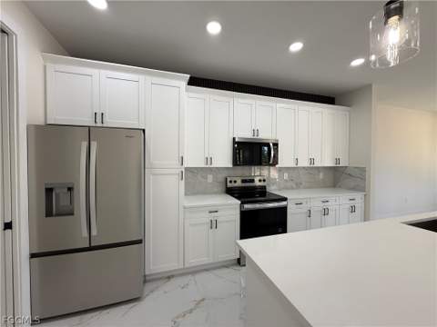 716 Castlestone Ave S, Lehigh Acres FL - photo 15 of 49