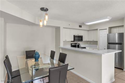 1230 Wildwood Lakes Blvd 105, Naples FL - photo 8 of 21