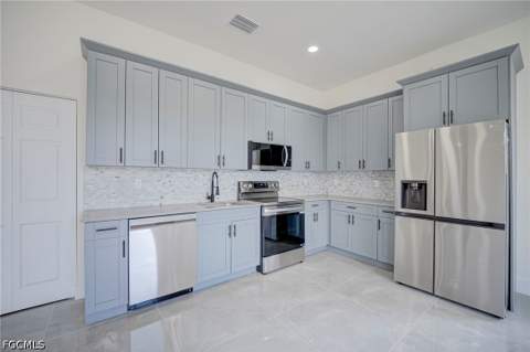 1134 Cumming St E, Lehigh Acres FL - photo 9 of 35