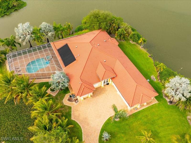 5 bedroom SingleFamilyResidence at 24885 Trost Blvd, Bell Villa, Bonita Springs — photo 5