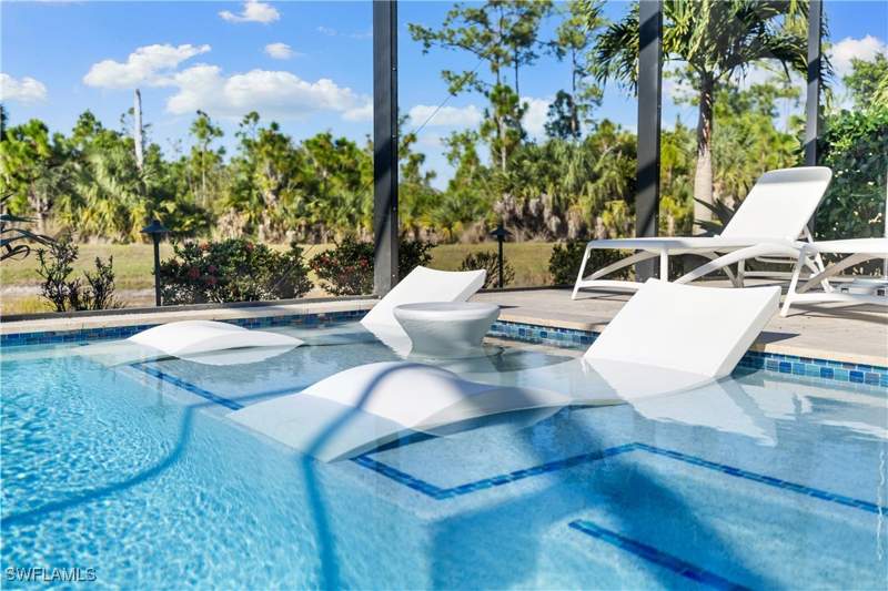4 bedroom SingleFamilyResidence at 4698 Abaca Cir, Raffia Preserve, Naples — photo 2