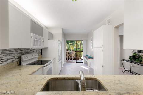 1828 Kings Lake Blvd 103, Naples FL - photo 12 of 31