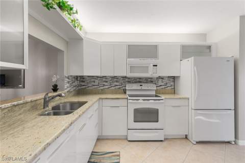 1828 Kings Lake Blvd 103, Naples FL - photo 13 of 31