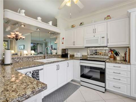 725 Saratoga Cir A101, Naples FL - photo 9 of 49