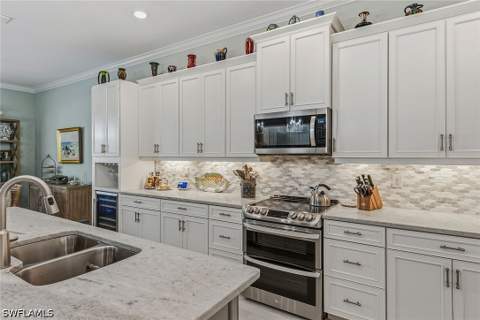 14685 Kelson Cir, Naples FL - photo 10 of 48