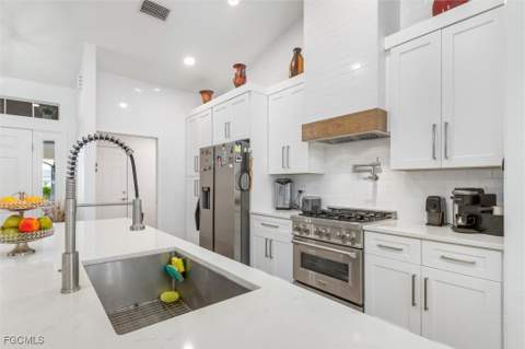 2306 NE 34th St, Cape Coral FL - photo 9 of 47