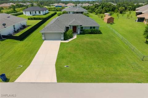 1909 Richland Ave, Lehigh Acres FL - photo 6 of 32