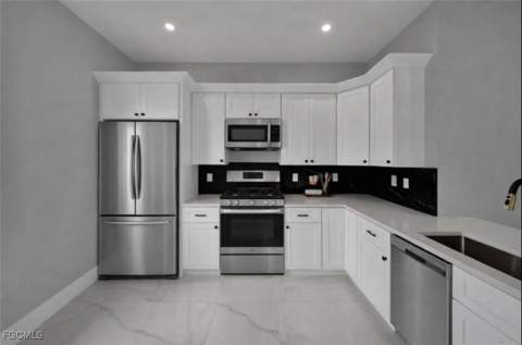 727 Santa Lucia Ave S, Lehigh Acres FL - photo 6 of 39