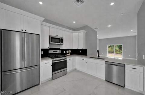 727 Santa Lucia Ave S, Lehigh Acres FL - photo 7 of 39