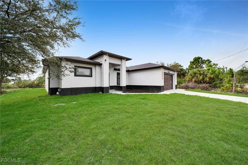 4 bedroom SingleFamilyResidence at 1002 Kanuga St E, Lehigh Acres, Lehigh Acres — photo 5