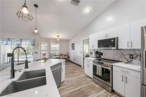 214 NW 25th Ave, Cape Coral FL - photo 9 of 35
