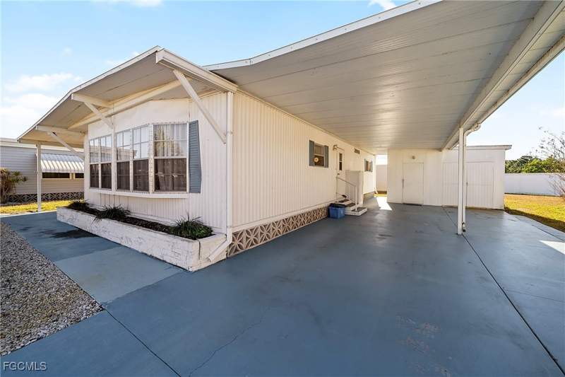 2 bedroom ManufacturedHome at 77 Snead Dr, Six Lakes Country Club, North Fort Myers — photo 2