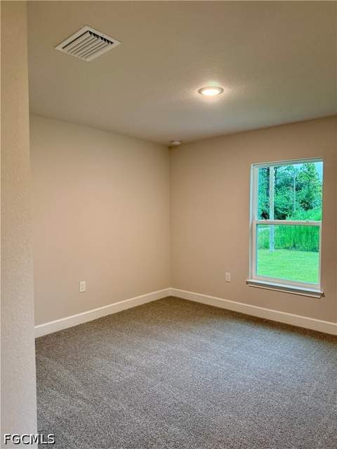 4707 Ruth Ave N, Lehigh Acres FL - photo 10 of 31