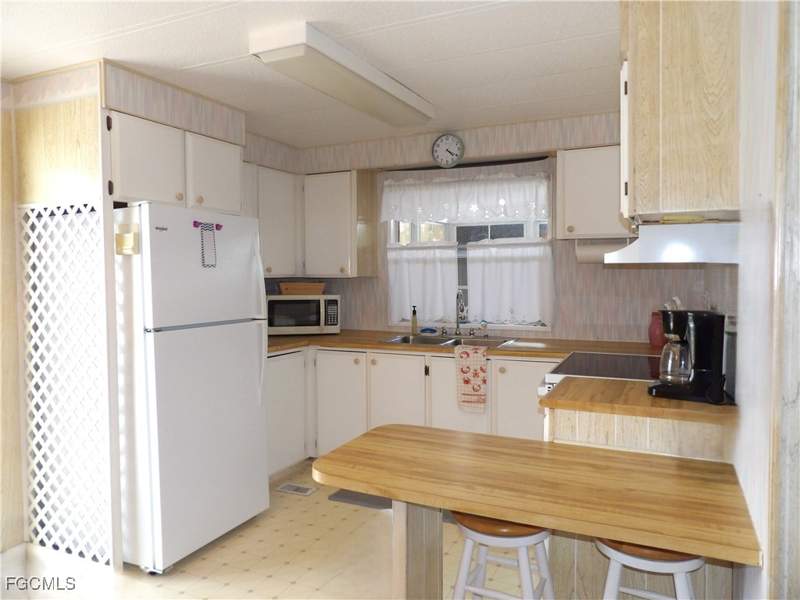 2 bedroom ManufacturedHome at 239 Shrub Ln N, Forest Park Mobile Home, North Fort Myers — photo 2