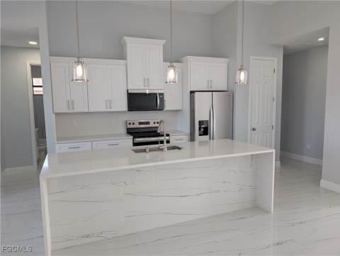 1032 NW 36th Pl, Cape Coral FL - photo 7 of 37