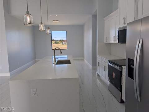 1032 NW 36th Pl, Cape Coral FL - photo 9 of 37