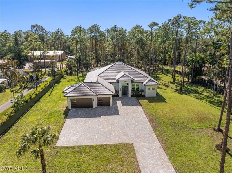 4 bedroom SingleFamilyResidence at 5080 Hickory Wood Dr, Logan Woods, Naples — photo 4