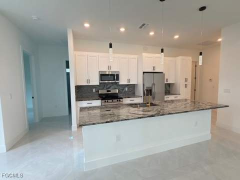 1504 W 9th St, Lehigh Acres FL - photo 13 of 45