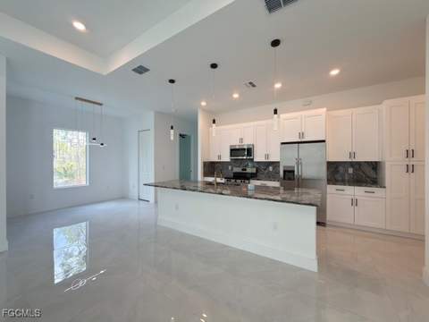 1504 W 9th St, Lehigh Acres FL - photo 7 of 45